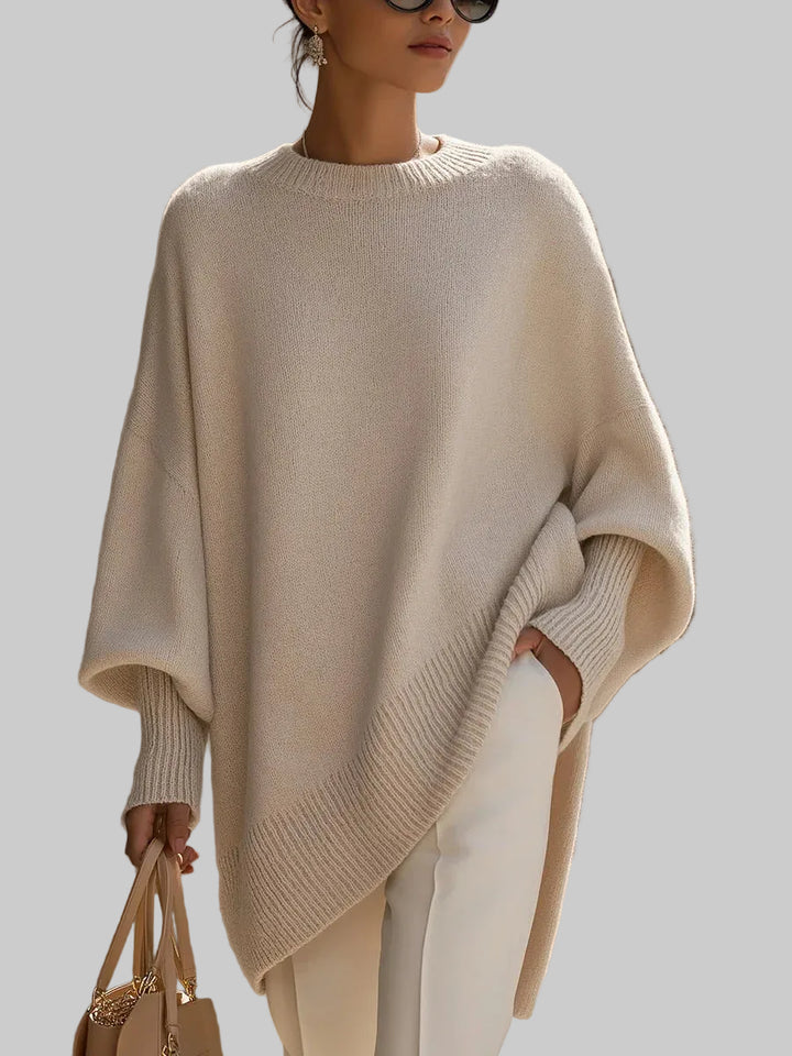 Women's Oversized Knitted Jumper with Drop Shoulders and Asymmetric Hem