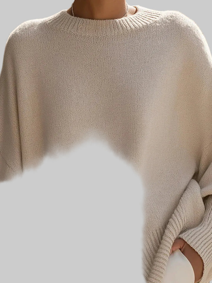Women's Oversized Knitted Jumper with Drop Shoulders and Asymmetric Hem