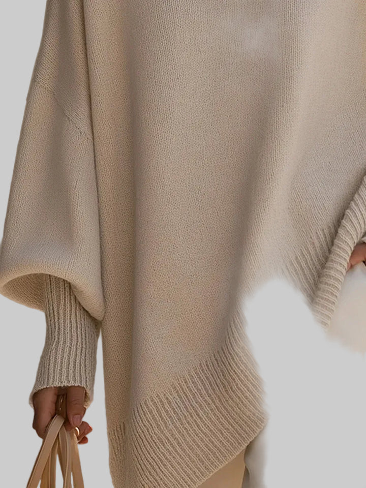Women's Oversized Knitted Jumper with Drop Shoulders and Asymmetric Hem