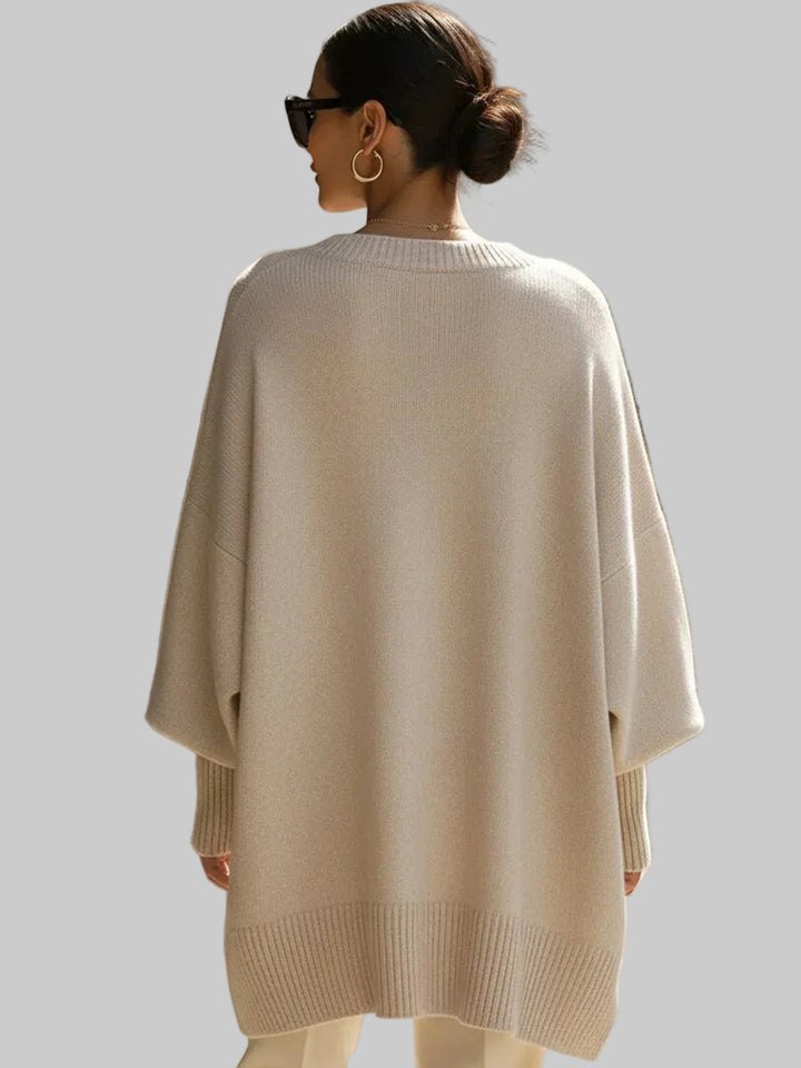 Women's Oversized Knitted Jumper with Drop Shoulders and Asymmetric Hem