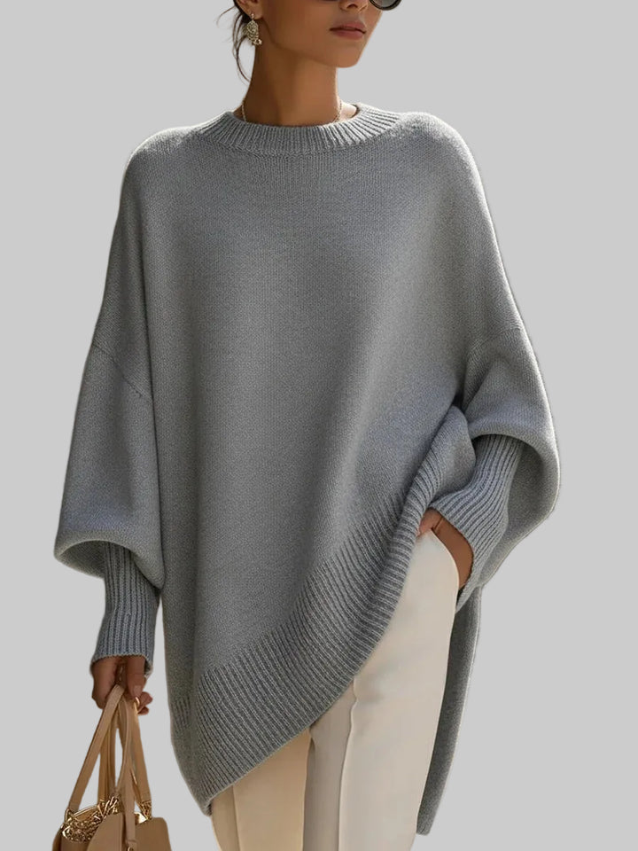 Women's Oversized Knitted Jumper with Drop Shoulders and Asymmetric Hem